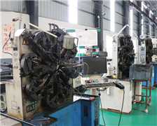 What is the function of the spring machine?